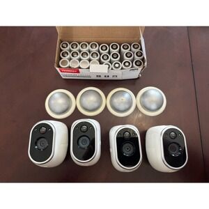 4 Arlo VMC3030 HD Wireless Add-On Security Cameras, With Mounts & 28 Batteries
